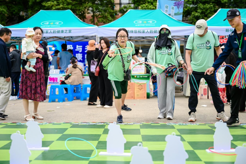蓝花楹盛开的母亲节，奥运冠军带领500市民“走花路”